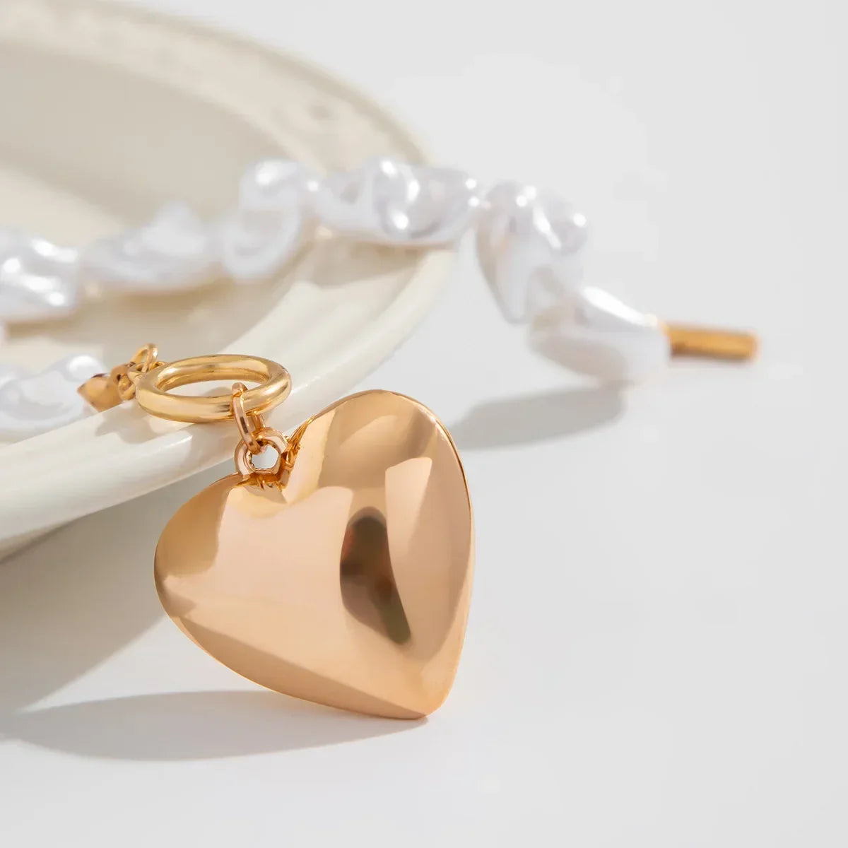 Pearl-Style Bracelet with Heart Charm and Toggle Clasp