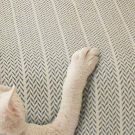 Herringbone sofa cover in a modern living room
