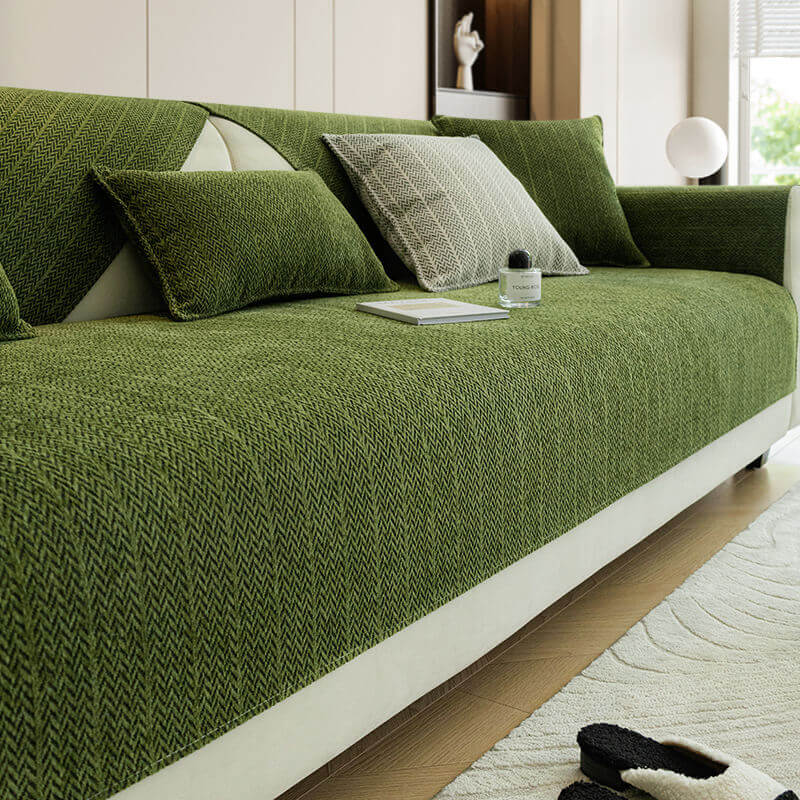 Green herringbone woven sofa cover with matching cushions