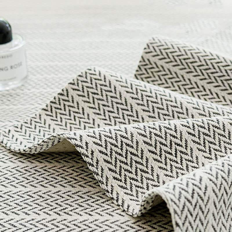 Herringbone sofa cover with matching cushion covers