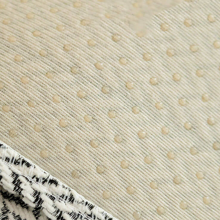 Close-up of the woven herringbone sofa cover pattern