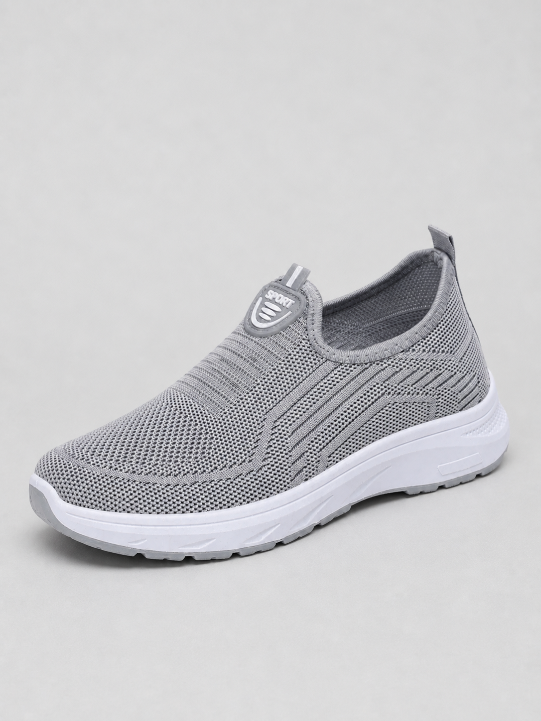 Grey slip-on knit trainer with a white sole