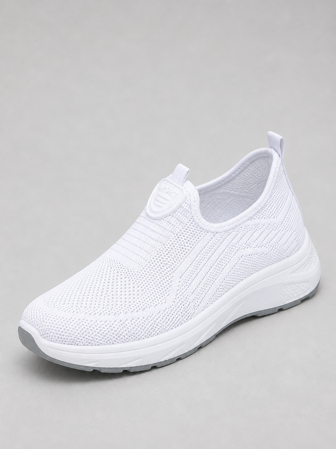 White slip-on knit trainer with a white sole