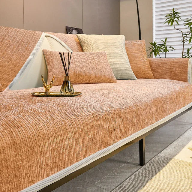 Orange woven fabric sofa cover with a fine textured finish and cream trim