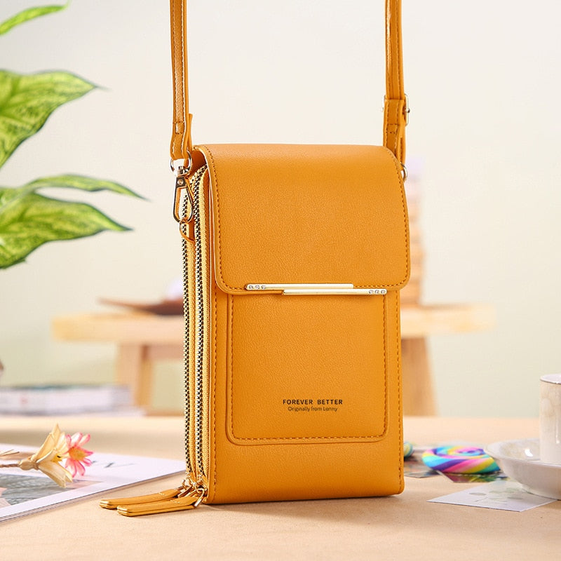 Yellow faux leather crossbody phone bag with front flap and gold-tone detail