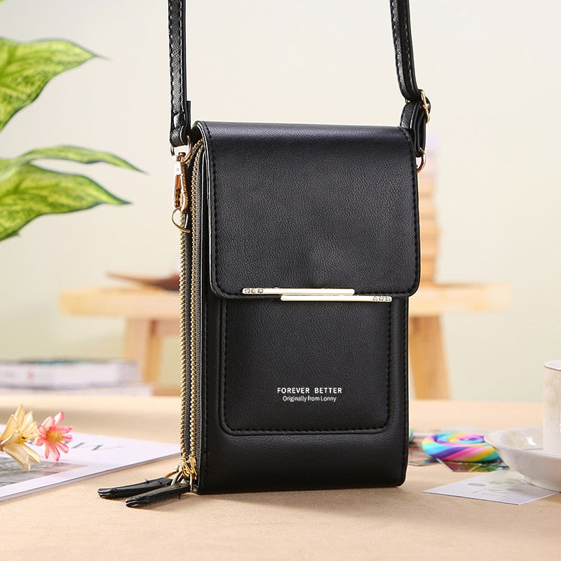 Black faux leather crossbody phone bag with adjustable shoulder strap