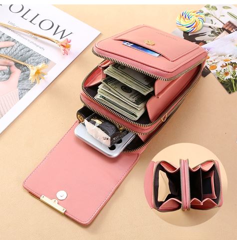 Pink crossbody phone bag open to show zipped compartments, a card slot and a phone