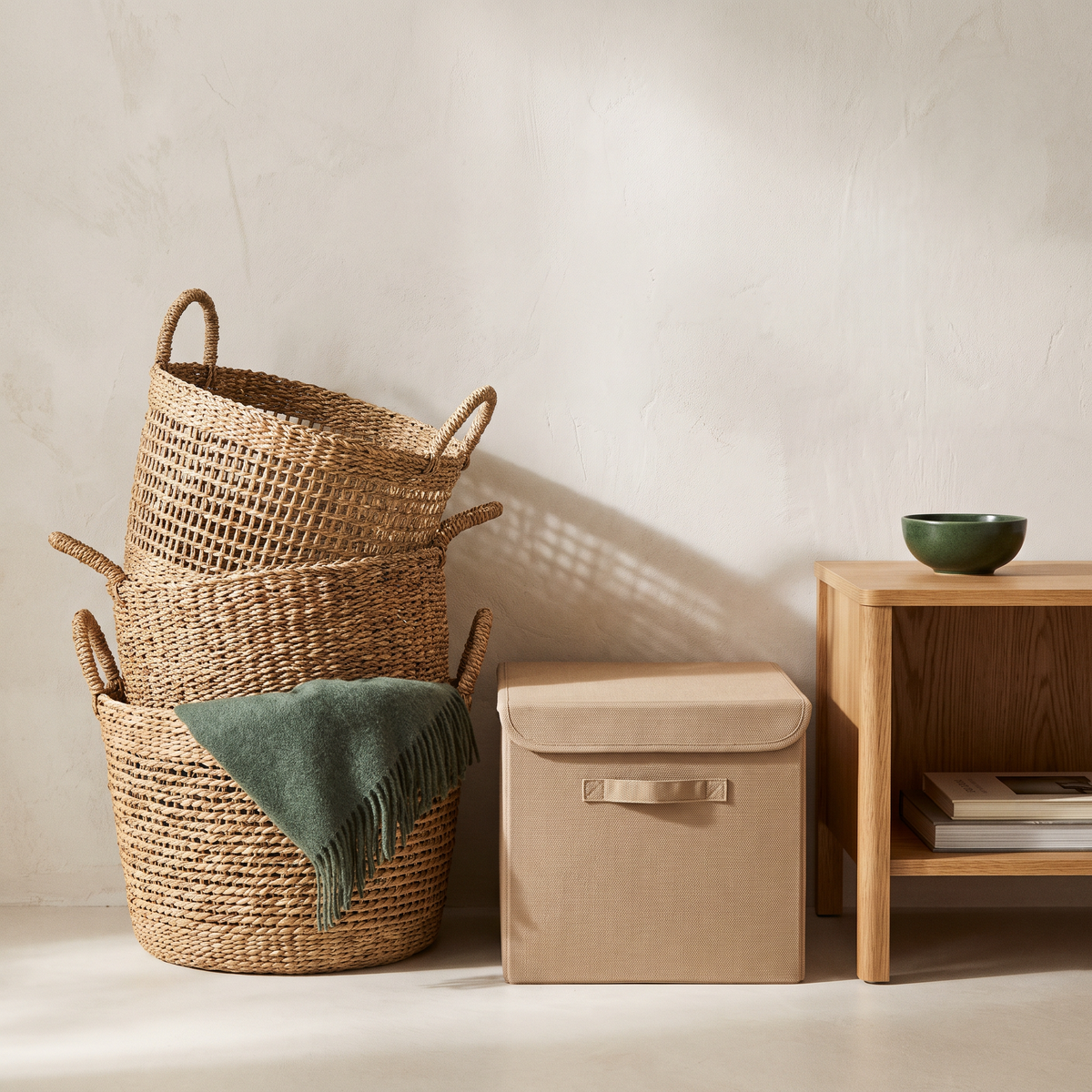 Stacked seagrass baskets and oak shelf unit