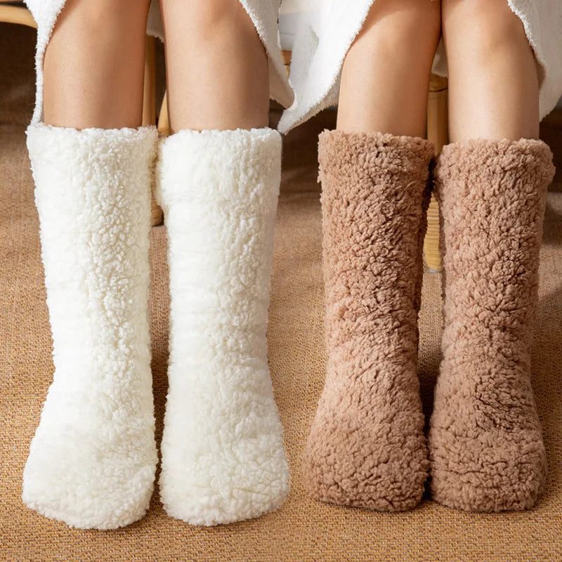 Women's white and brown fluffy teddy fleece mid-calf socks worn side by side