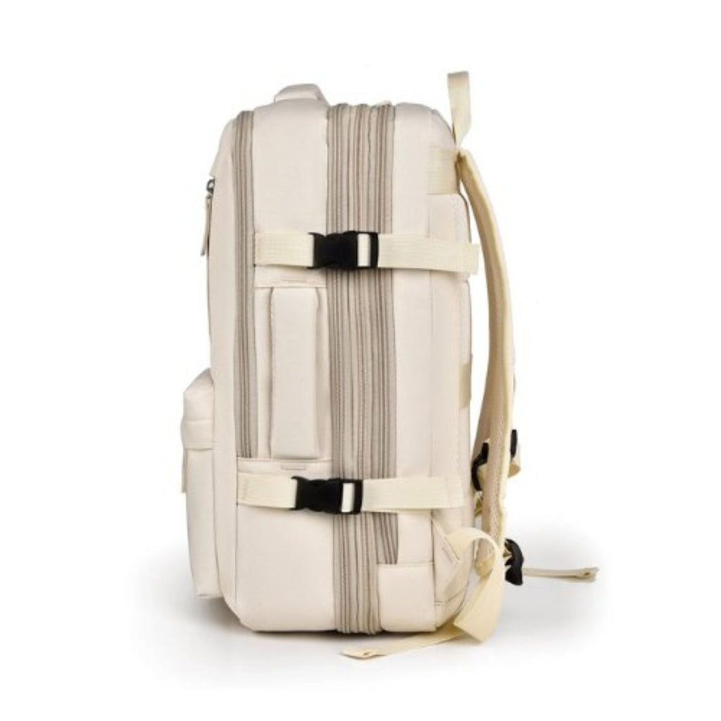 Side view of beige backpack with compression straps and side zips