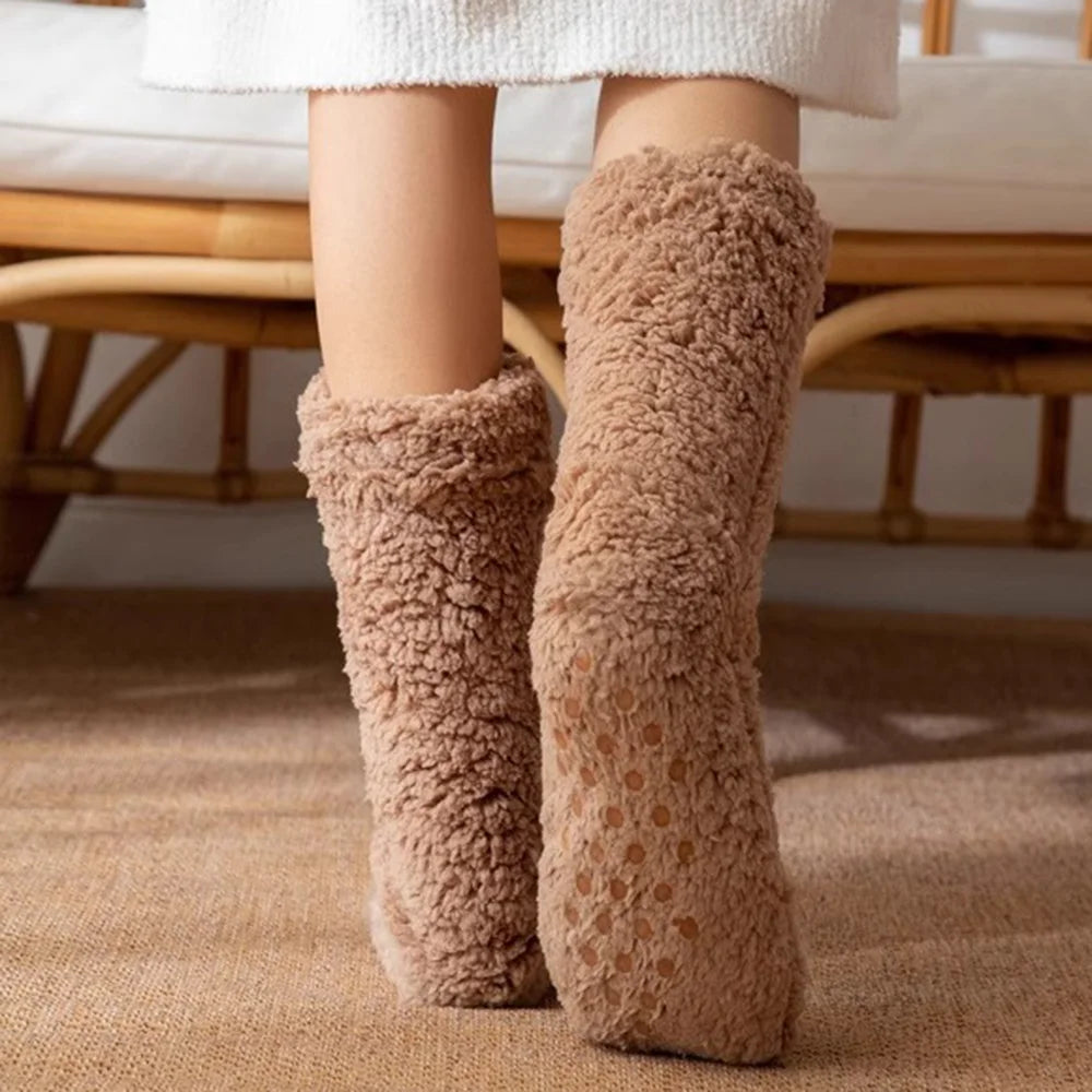 Back view of brown fluffy socks showing the sole of the sock