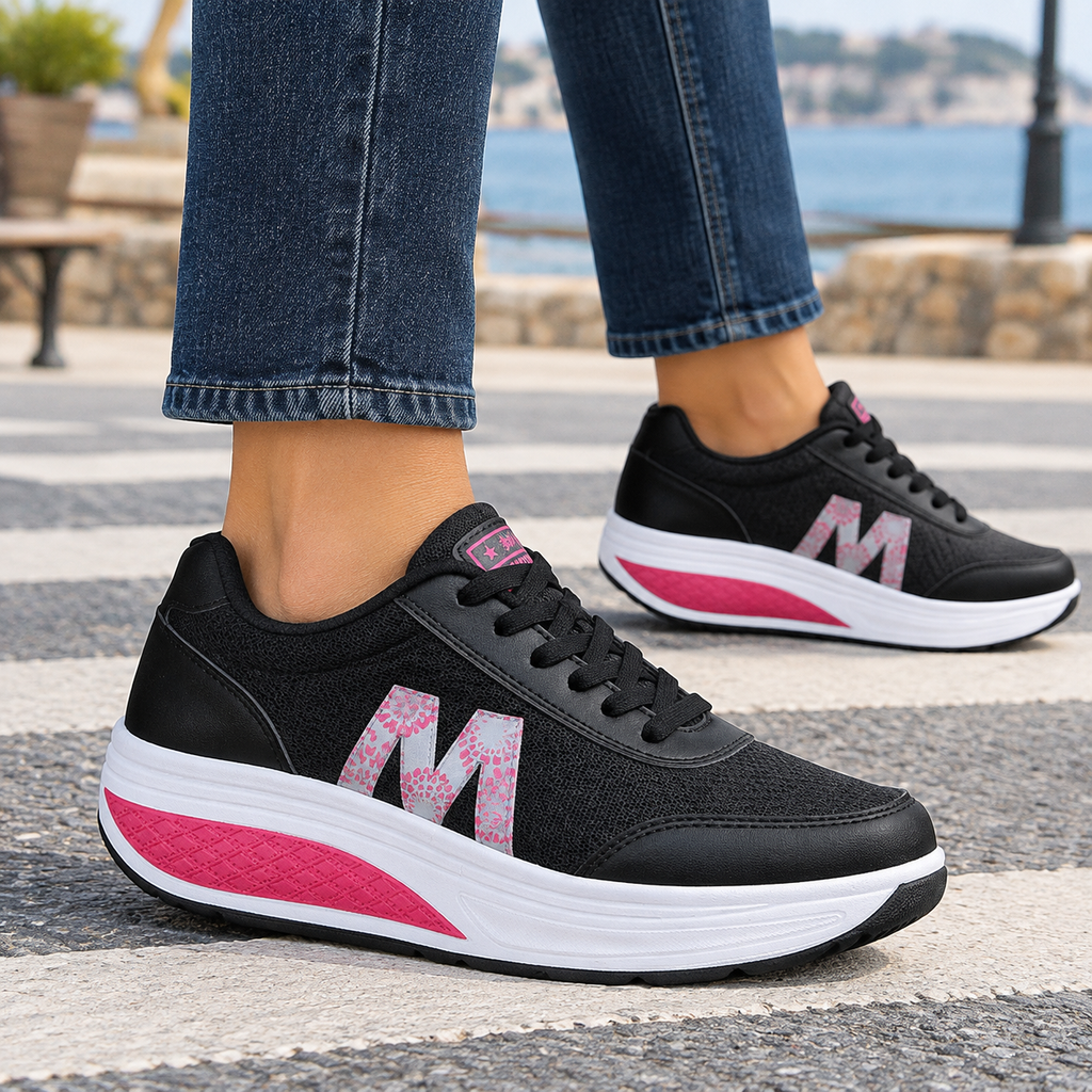 Black orthopedic sneakers for women with mesh upper, lace-up front and rocker platform sole. Great orthopedic sneakers for walking.