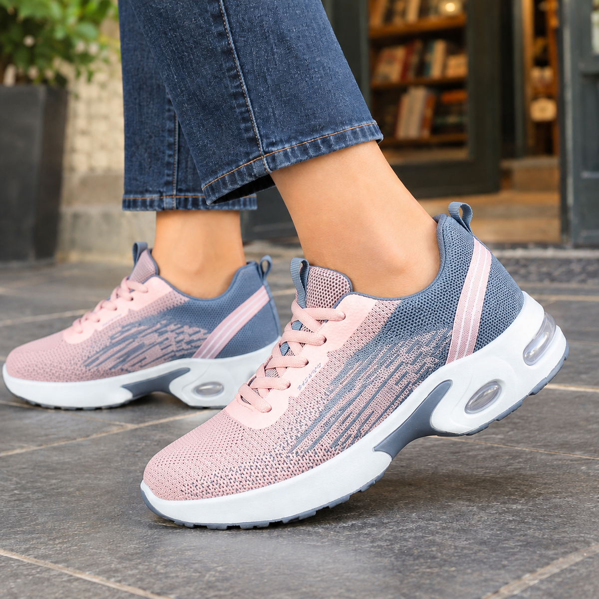 Pink women's knit lace-up trainers with sculpted sole