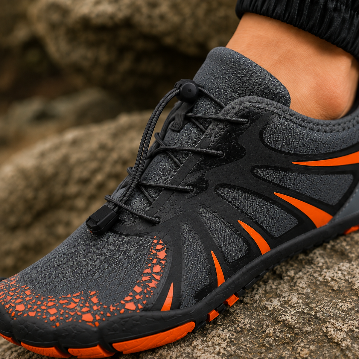 Close-up of the mesh upper, toggle closure and segmented sole of the water shoes