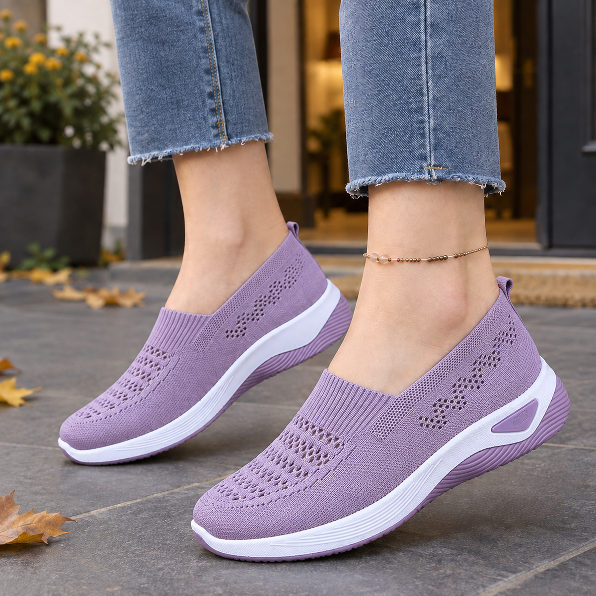 Light purple breathable knit slip-on trainers for women with a low raised sole