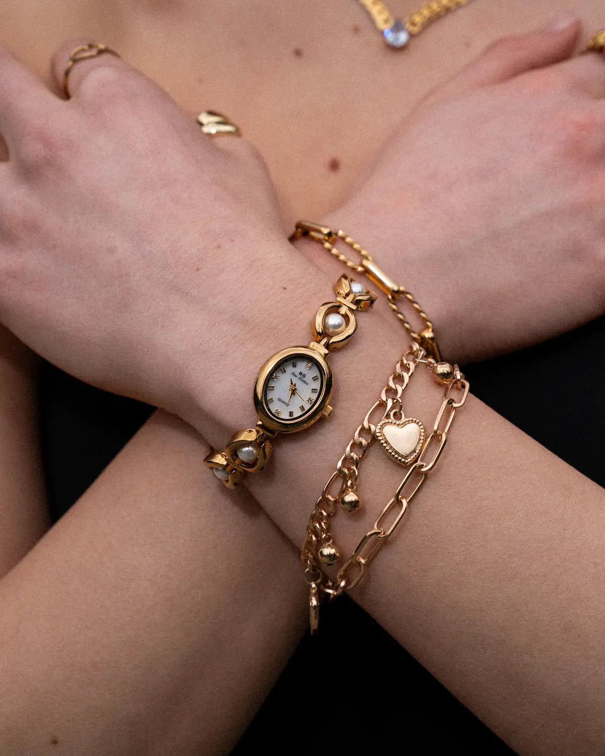 Women's Oval Dial Watch with Decorative Link Bracelet