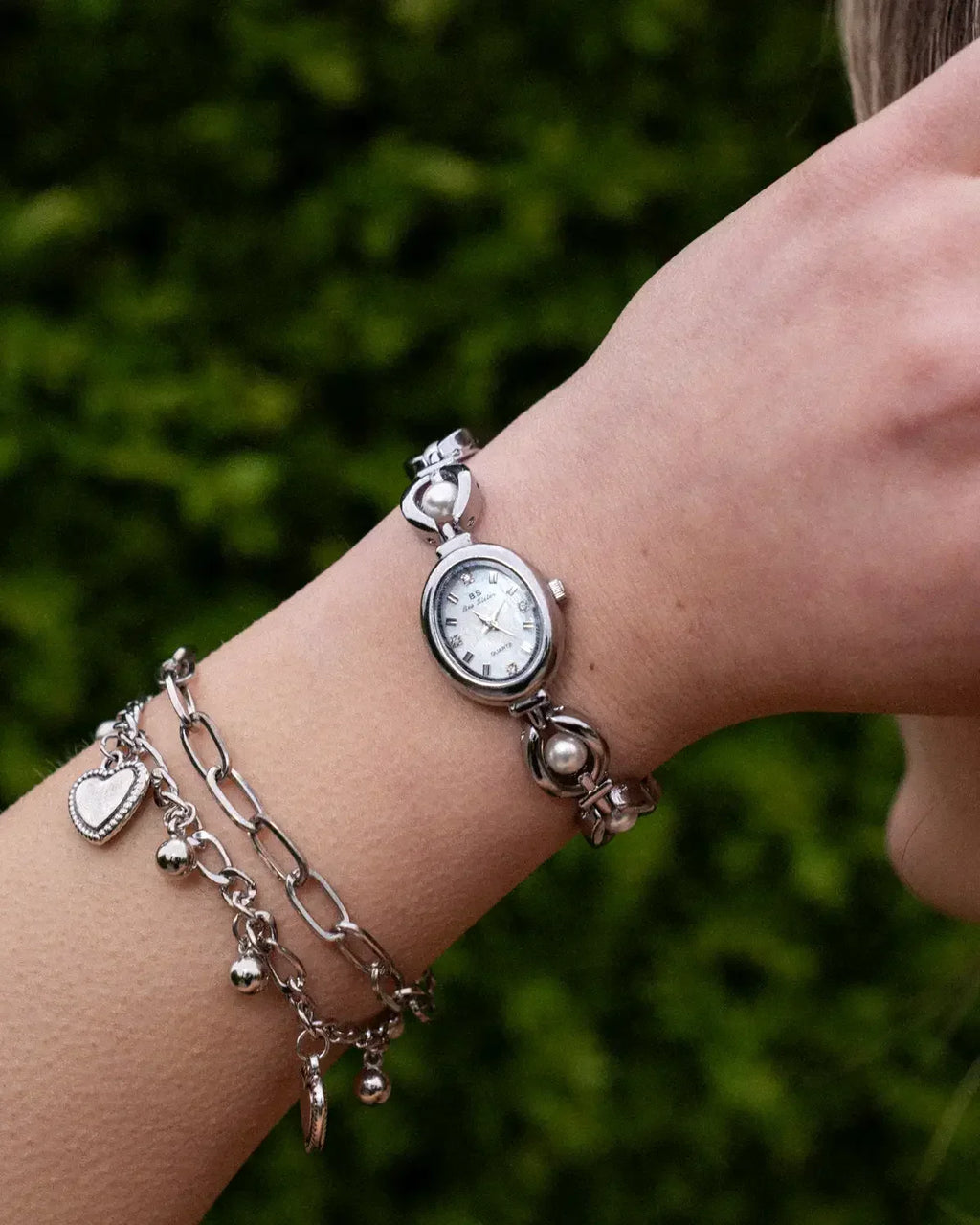 Women's Oval Dial Watch with Decorative Link Bracelet