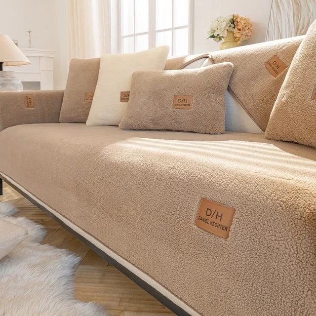 Brown teddy fleece sofa cover on a sofa with matching cushion covers in a bright living room